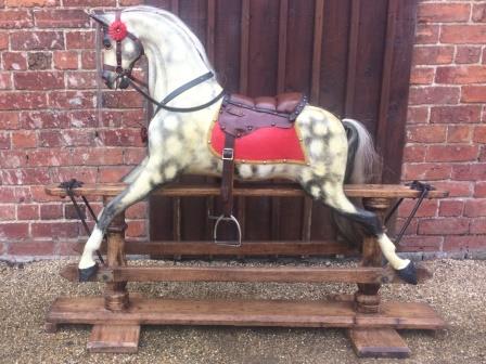old extra carved rocking horse