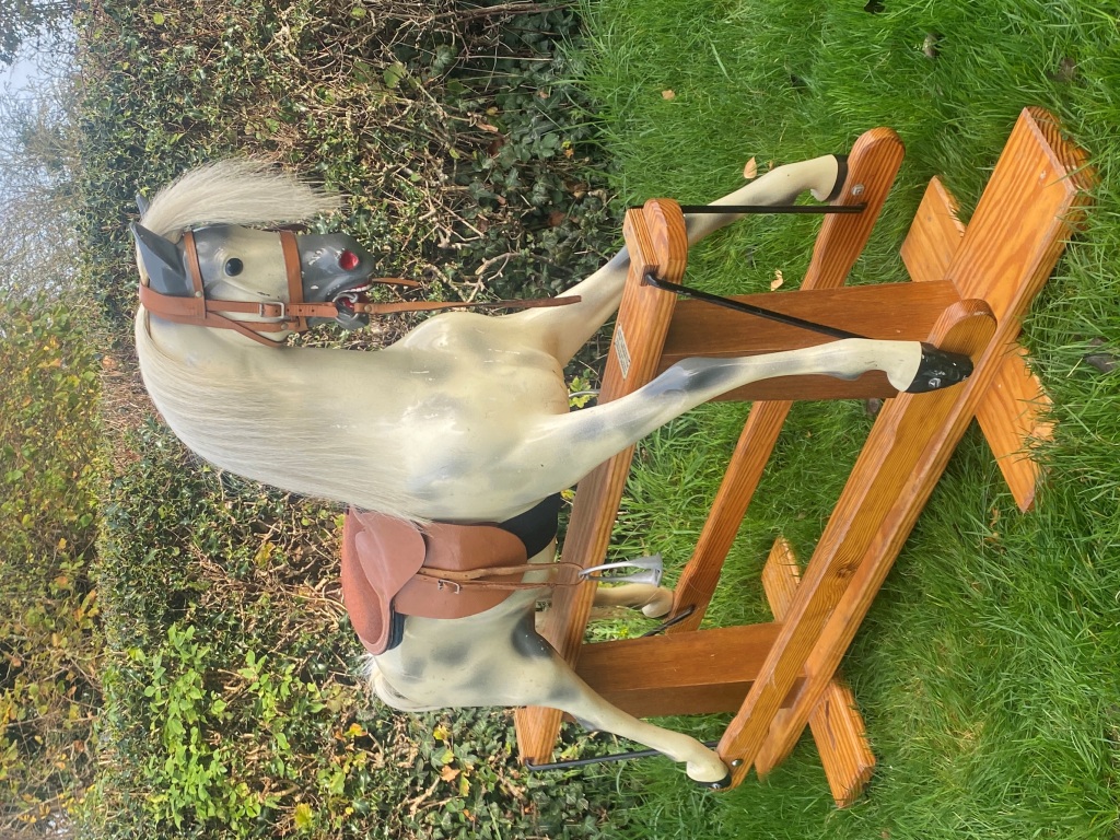 extra carving on neck of lines rocking horse